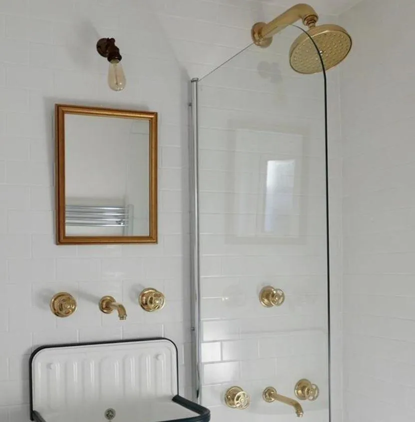 BT20 3 hole wall mounted basin taps "wheels"