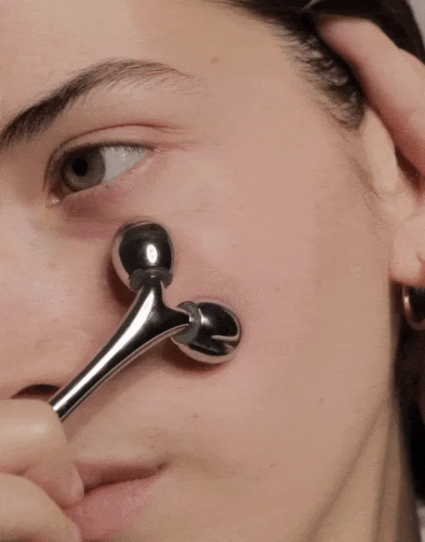 Masajeador facial roller metal
