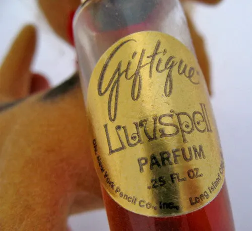 VINTAGE GIFTIQUE LUVSPELL PARFUM Half-Full 1/4 FL OZ PERFUME PERFUMES Fragrance DOG Figurine Figurines